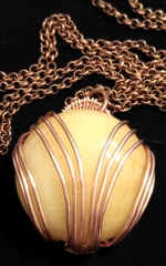 round art-deco butterscotch stone pendant